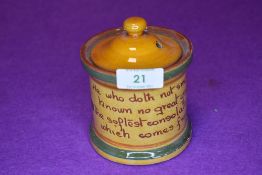 A vintage Cornish ware style ceramic smokers tobacco jar with motto inscribed