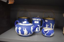 A ceramic tea set by Wedgwood in the Jasperware design in deep blue ground