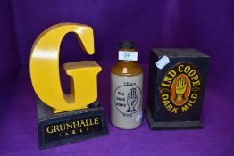Two pub tavern bar advertising tap lights for Ind Cooper and Grunhalle lager also similar stone ware