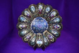 A papier mache an lacquer work plaque in the form of a lotus of similar flower
