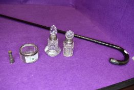 A small selection of glass dressing table items having HM silver fitments also with a bent wood cane