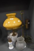 A converted students library oil lamp with two additional shades