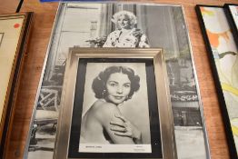 A photographic print of Marilyn Monroe and Jennifer Jones