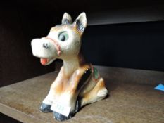 A vintage chalk ware donkey money box.