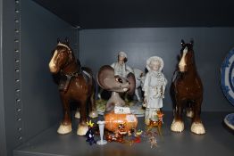 A selection of decorative figurines including two Beswick Shire Mare brown horses 818, nodding
