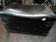 A leather effect padded case or storage box.