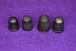 Four HM silver thimbles of various designs