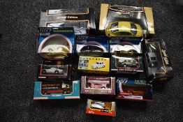 A selection of modern diecasts including Burago 1:18 scale Beetle, Maisto 1:18 scale Lamborghini,