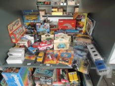 A shelf of modern diecasts including Corgi, Ertl, Solido, Days Gone etc, all boxed