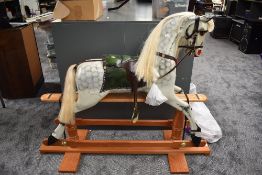 A modern traditional style Rocking horse made by Ron Wood of Lancaster, in dapple grey with green