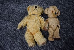 Two mid 20th century straw filled, yellow plush jointed Teddy Bears, Merrythought having plastic