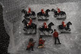 Six Lead flat figures, Black Horse with Rider wearing red jacket, all on base stand along with three