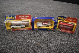 A Corgi diecast, James Bond Aston Martin in silver with red interior with driver, bandit and spare