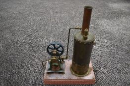 A well engineered Single Cylinder vertical live steam model Mill Engine having spoked flywheel,