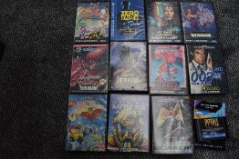 A Sega 16 Bit Mega Drive Console with 12 game cartridges, Sonic 2 no manual, VJ Boy, Zero Tolerance,