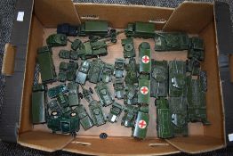 A box of Dinky and similar Military Vehicles and Field Guns including Tank Transporter, Tanks,