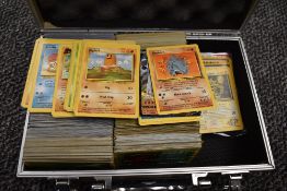 A large collection of Pokemon Cards, mainly unlimited, including 5 Trainer 1st edition cards, Energy