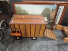 A 1960's Triang style plastic and wooden converted Horse Box having Britains and similar plastic