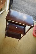 A late 19th or early 20th Century mahogany etage of nice proportions having turned frame, width