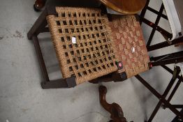 A pair of traditional strung stools including Arts and Crafts style