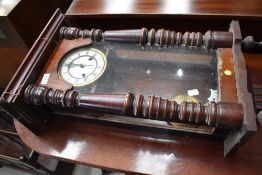 A late 19th or early 20th Century mahogany cased wall clock