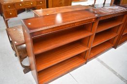 A pair of reproduction mahogany bookshelves, possibly Shaw of London