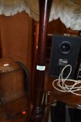 A traditional stained frame standard lamp