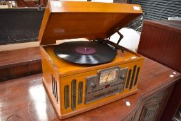 A reproduction Gramophone having LP, cassette and radio options