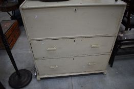 An early 20th Century bedding box with two drawers to base, deco style handles, width approx. 101cm