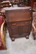 An early 20th Century oak bureau