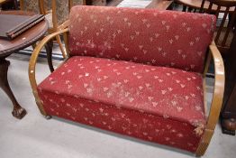 A stained frame settee in the Art Deco style with moquette upholstery
