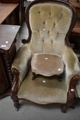 A 19th Century mahogany scroll frame armchair and similar footstool