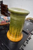 A Leeds Art Pottery jardinere stand, slip glazed, height approx. 41cm, diameter approx 26cm,