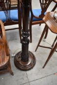 A traditional stained frame standard lamp