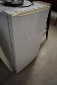 An unbranded under counter fridge