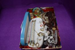 A selection of costume jewellery including simulated pearls, cased Buler watch with a variety of