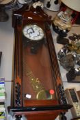 A 31 day movement mahogany cased wall clock.