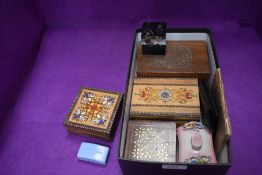 A selection of misc items including lapel pins, small wooden jewellery boxes, Rhodesian coins, key