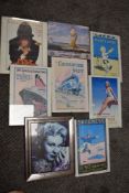 A selection of vintage style prints in frames.