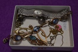 A small selection of costume jewllery including screw back earrings, gold plated loop style stud