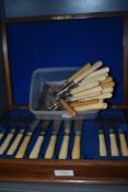 Two canteens of plated fish knives and forks having engraved blades and bone handles, and a small