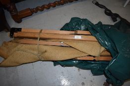 A vintage canvas military or military style camp bed