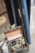 A vintage Eumig projector and screen