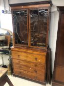 An Edwardian mahogany secretaire bookcase having astral glazed top with ebonised detailing , lower