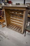 A wood store, by Oakenclough buildings, width approx. 131cm, overall depth 64cm