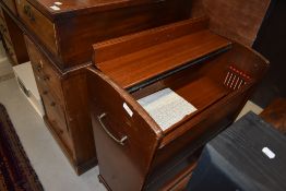 A vintage sapele cocktail trolley