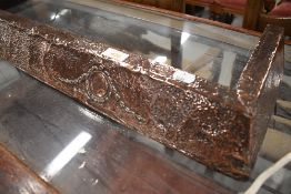A small planished copper fire fender, internal width approx tapered 68-73cm