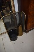 A brass tri fold fire guardc, coal bucket and scuttle