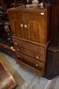A mid 20th Century walnut tallboy