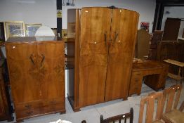 A 1930s walnut bedroom suite